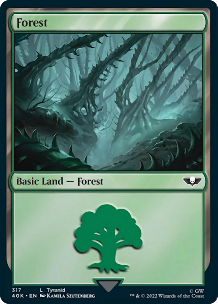 Forest (317) (Surge Foil) [Universes Beyond: Warhammer 40,000] | Tabernacle Games